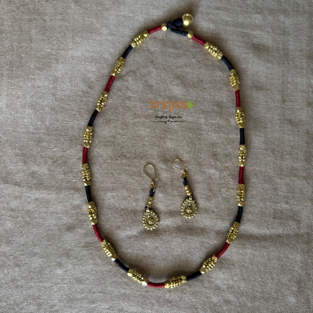 Brass beads long necklace in red and black thread with earrings.