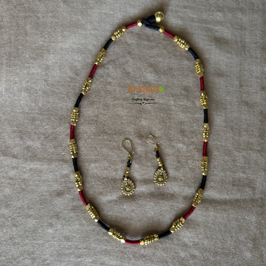 Brass beads long necklace in red and black thread with earrings.